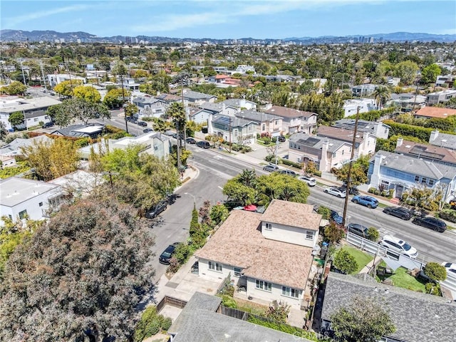 aerial view with a mountain view and a residential view