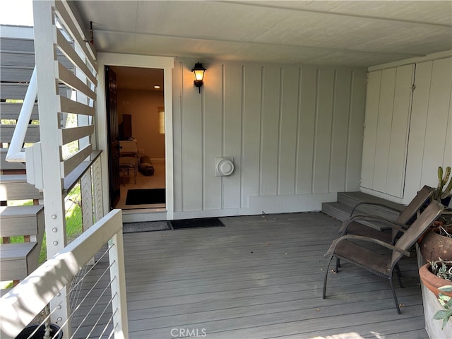 wooden deck featuring stairs