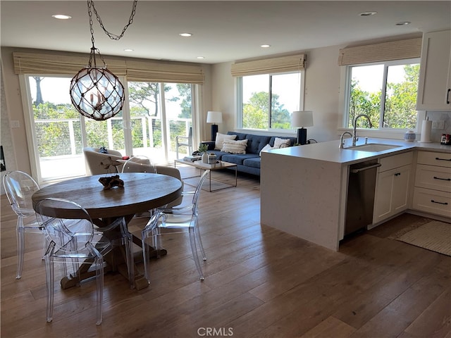 dining room featuring recessed lighting and wood finished floors