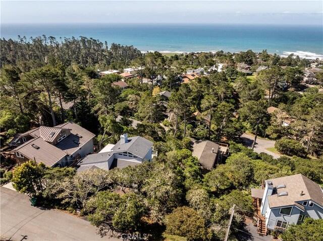 bird's eye view featuring a water view and a residential view