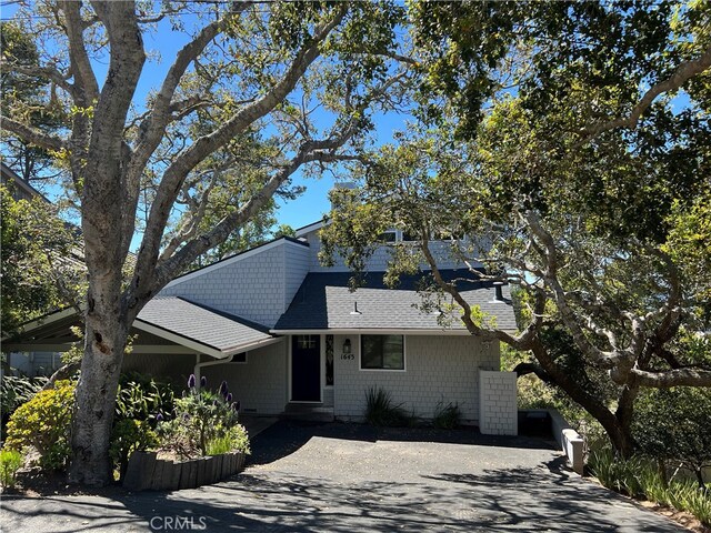 view of front of home with roof with shingles