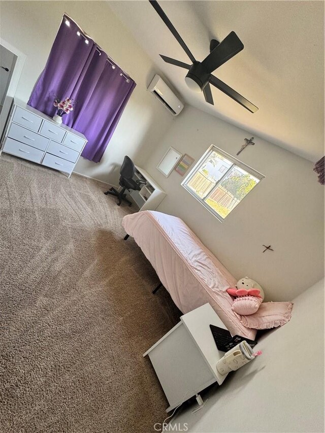 26659 6th St, Highland, CA 92346 - bedroom featuring a wall unit AC, carpet flooring, a ceiling fan, and vaulted ceiling