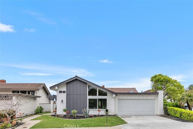 625 Calle Miguel, San Clemente, CA 92672 - mid-century home featuring an attached garage, concrete driveway, and a front lawn