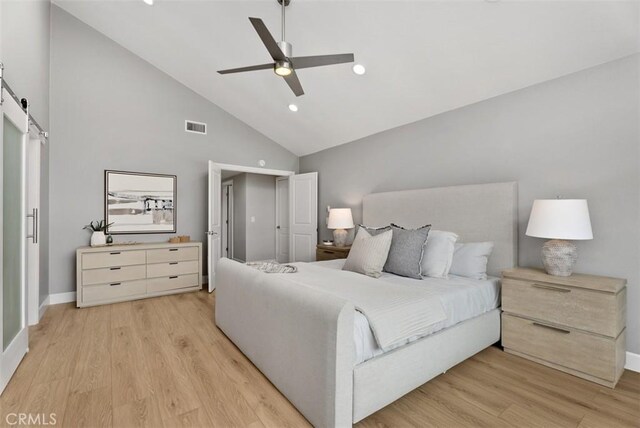625 Calle Miguel, San Clemente, CA 92672 - bedroom with a barn door, light wood-type flooring, high vaulted ceiling, recessed lighting, and ceiling fan