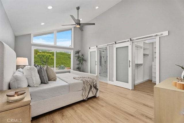 625 Calle Miguel, San Clemente, CA 92672 - bedroom featuring high vaulted ceiling, light wood-style floors, recessed lighting, ceiling fan, and a walk in closet