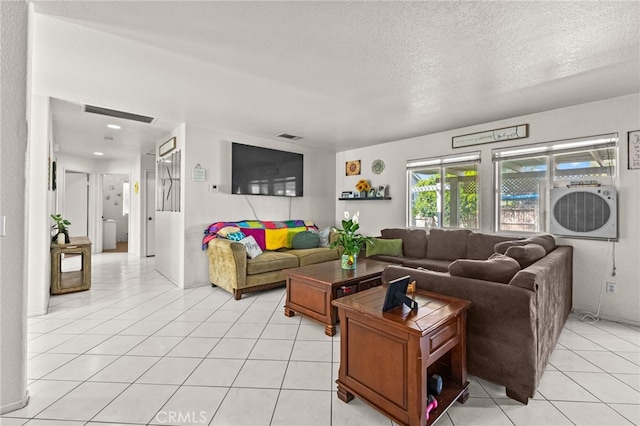 1509 Trinette Dr, Beaumont, CA 92223 - living room featuring recessed lighting, visible vents, a textured ceiling, and light tile patterned flooring