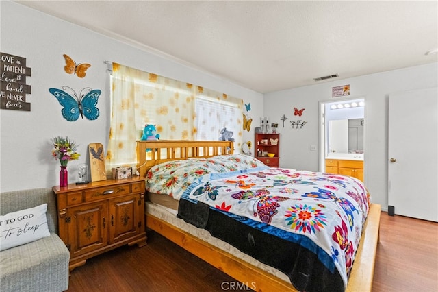 1509 Trinette Dr, Beaumont, CA 92223 - bedroom featuring dark wood-type flooring, visible vents, and ensuite bath