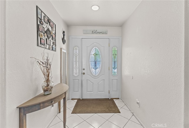 1509 Trinette Dr, Beaumont, CA 92223 - foyer entrance featuring light tile patterned flooring and a textured wall