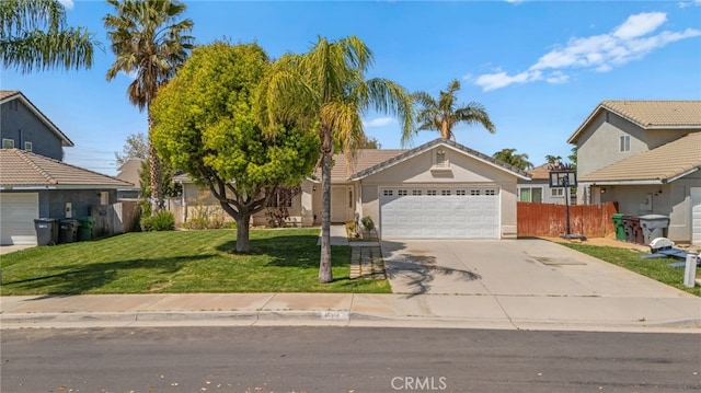 1509 Trinette Dr, Beaumont, CA 92223 - view of front facade featuring a garage, stucco siding, fence, a front lawn, and concrete driveway