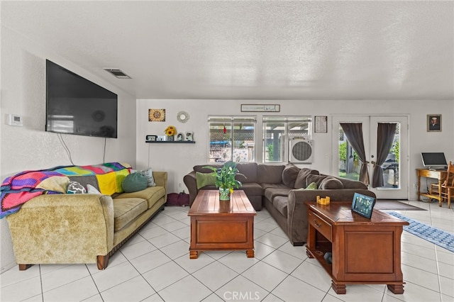 1509 Trinette Dr, Beaumont, CA 92223 - living area with a textured ceiling, french doors, light tile patterned floors, and visible vents