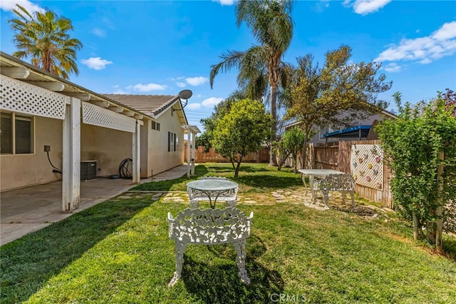 1509 Trinette Dr, Beaumont, CA 92223 - view of yard with fence, a patio, and central air condition unit