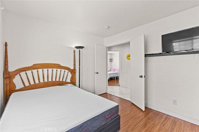 1509 Trinette Dr, Beaumont, CA 92223 - bedroom with baseboards and wood finished floors