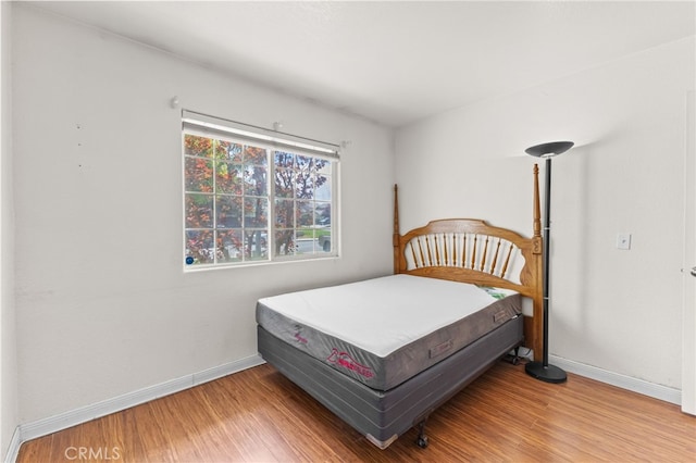 1509 Trinette Dr, Beaumont, CA 92223 - bedroom featuring baseboards and wood finished floors