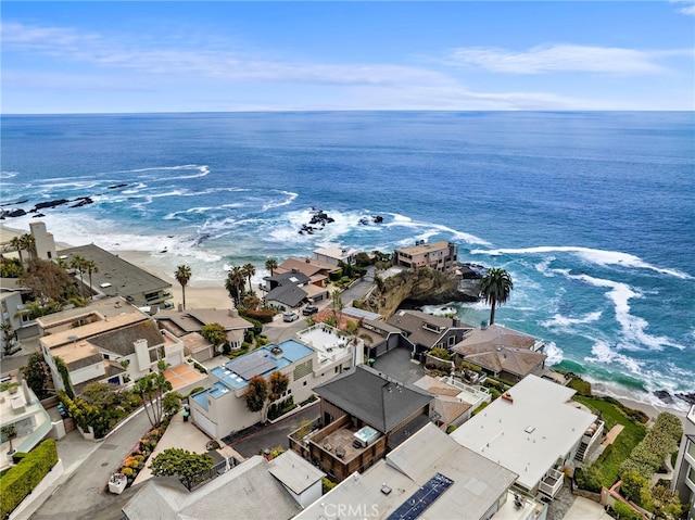 drone / aerial view featuring a water view and a residential view