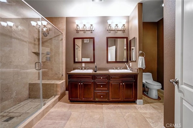 4805 Bellflower Ave Unit 205, North Hollywood, CA 91601 - bathroom featuring a shower stall, toilet, and a sink