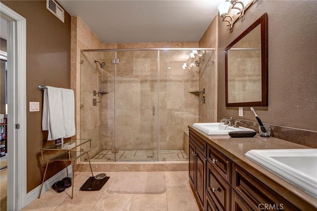 4805 Bellflower Ave Unit 205, North Hollywood, CA 91601 - full bath with a shower stall, tile patterned floors, a sink, double vanity, and visible vents