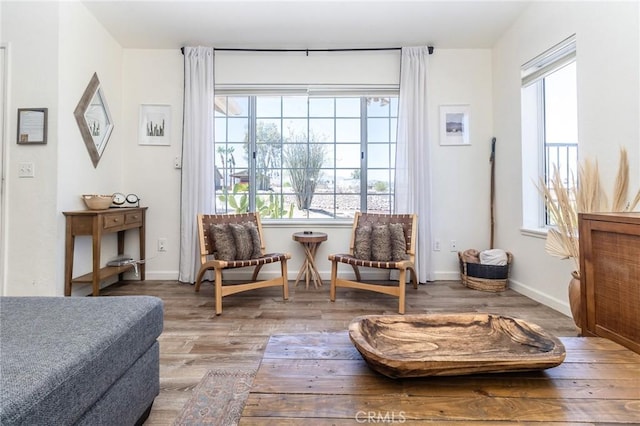 1929 Casa Linda St, Needles, CA 92363 - sitting room featuring baseboards, wood finished floors, and a healthy amount of sunlight