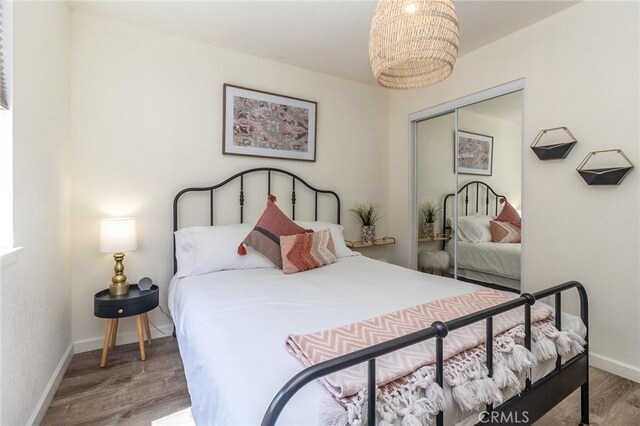 1929 Casa Linda St, Needles, CA 92363 - bedroom featuring a closet, baseboards, and wood finished floors