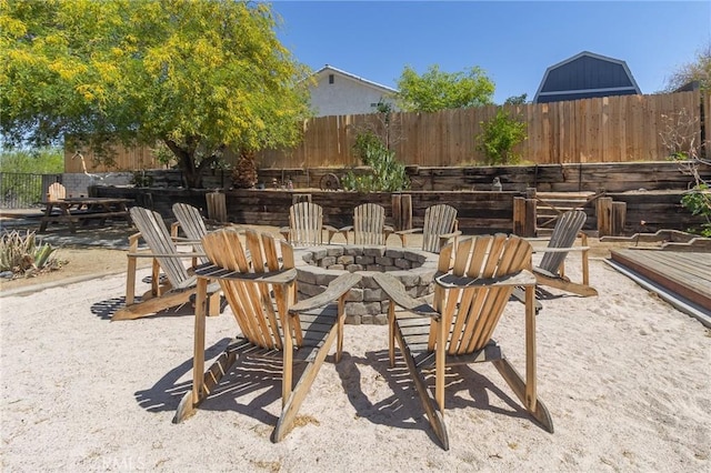 1929 Casa Linda St, Needles, CA 92363 - view of patio featuring fence and an outdoor fire pit