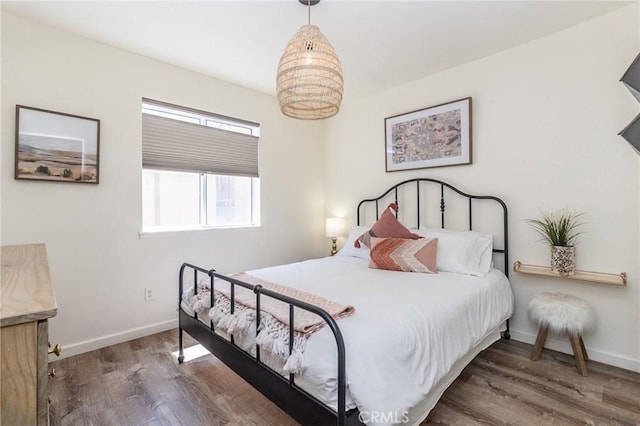 1929 Casa Linda St, Needles, CA 92363 - bedroom featuring baseboards and wood finished floors