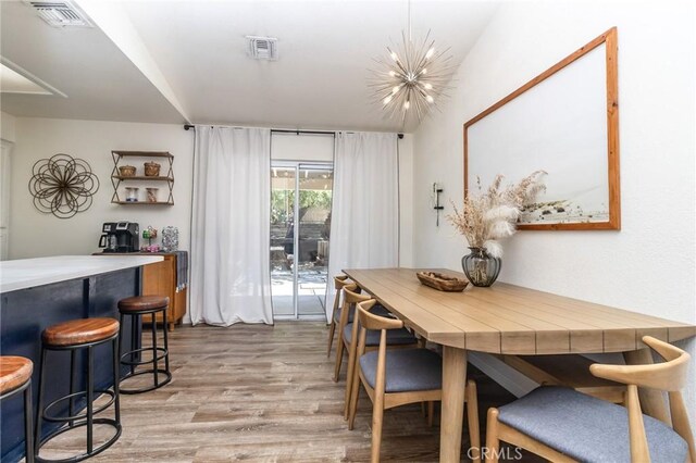 1929 Casa Linda St, Needles, CA 92363 - dining space with a chandelier, light wood finished floors, and visible vents