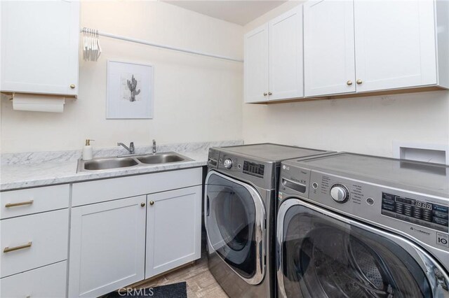 1929 Casa Linda St, Needles, CA 92363 - washroom with a sink, cabinet space, and washing machine and dryer