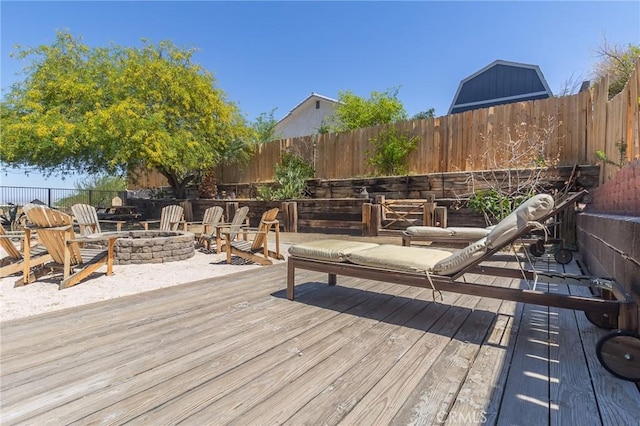 1929 Casa Linda St, Needles, CA 92363 - deck featuring a fenced backyard and a fire pit
