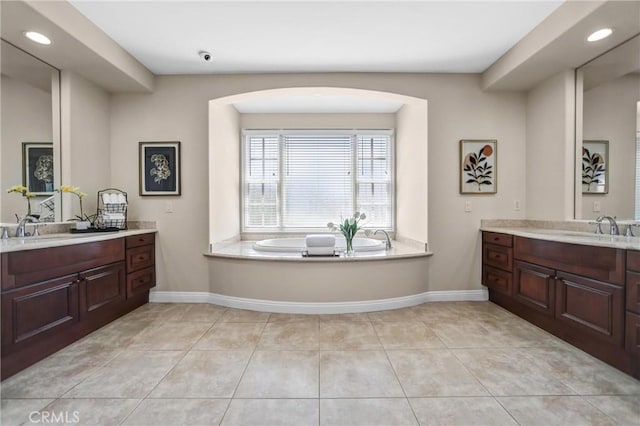 1489 Caballero Rd, Arcadia, CA 91006 - full bathroom with two vanities, tile patterned floors, a garden tub, and recessed lighting