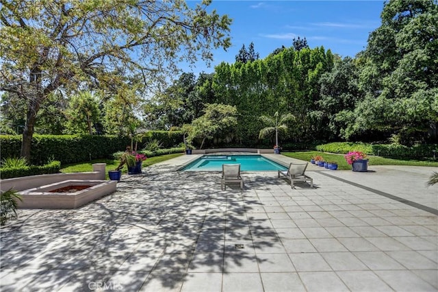1489 Caballero Rd, Arcadia, CA 91006 - view of pool with a patio and view of scattered trees