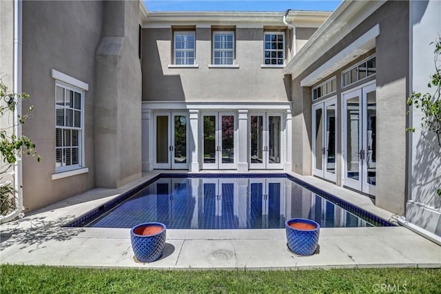 1489 Caballero Rd, Arcadia, CA 91006 - swimming pool with french doors and a patio area