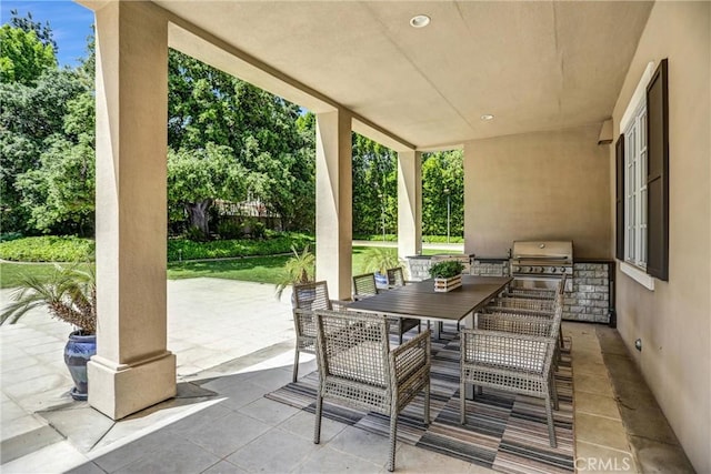 1489 Caballero Rd, Arcadia, CA 91006 - view of patio with an outdoor kitchen, outdoor dining area, and view of wooded area