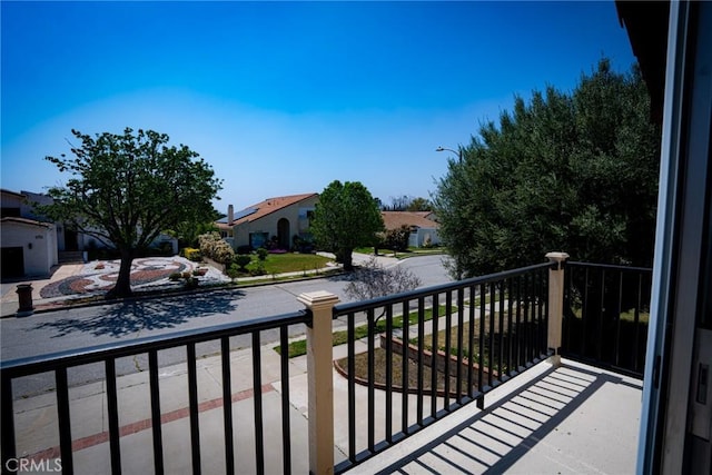 balcony featuring a residential view