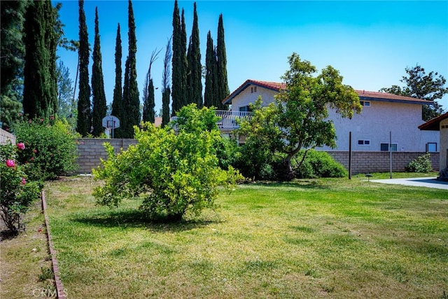 view of yard with fence