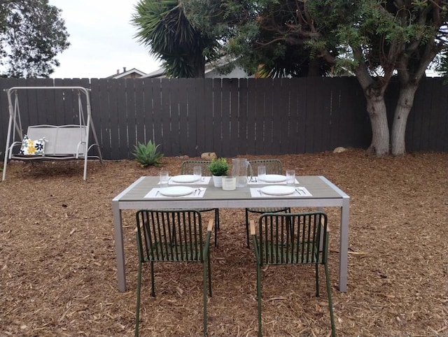 992 Churrituck Dr, San Diego, CA 92154 - view of yard with fence and outdoor dining space