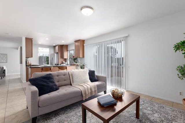 992 Churrituck Dr, San Diego, CA 92154 - living area with light tile patterned floors, baseboards, and recessed lighting