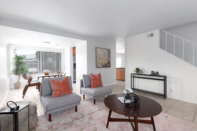 992 Churrituck Dr, San Diego, CA 92154 - living room featuring light tile patterned floors, plenty of natural light, and visible vents