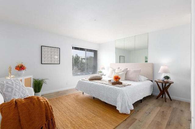 992 Churrituck Dr, San Diego, CA 92154 - bedroom with baseboards and light wood finished floors