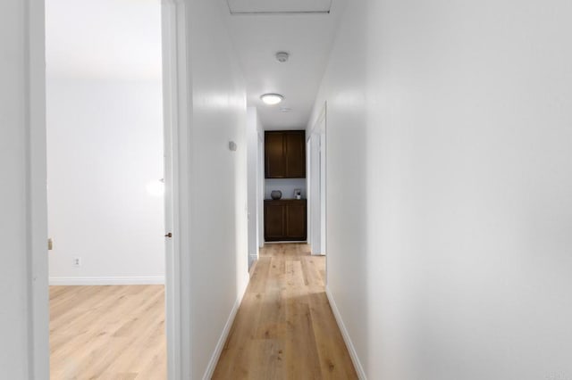 992 Churrituck Dr, San Diego, CA 92154 - hallway featuring baseboards and light wood-style floors