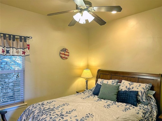 bedroom featuring ceiling fan