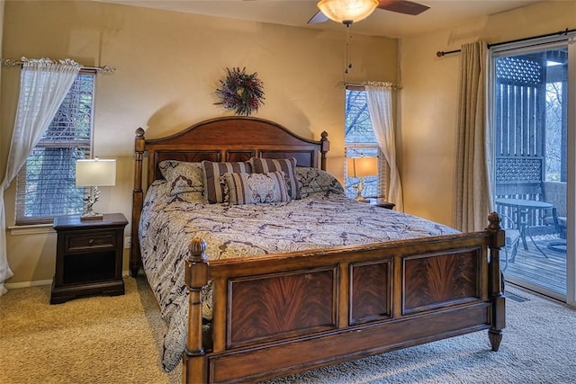 bedroom with baseboards, a ceiling fan, and carpet flooring