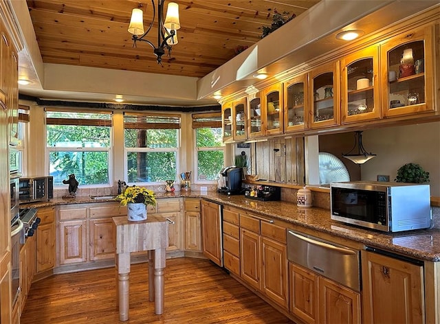 kitchen with stainless steel microwave, wooden ceiling, wood finished floors, and a warming drawer