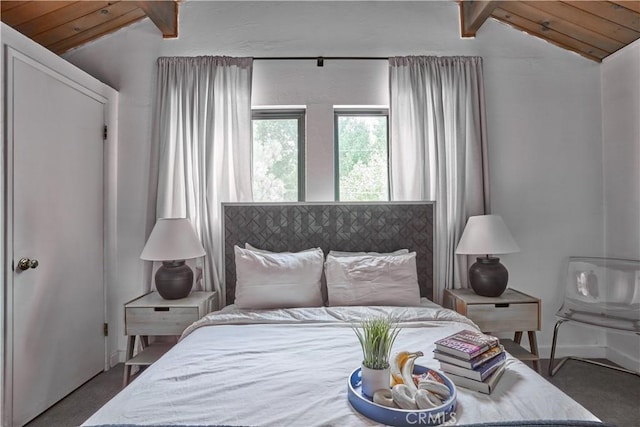 bedroom with wood ceiling, baseboards, lofted ceiling with beams, and carpet flooring