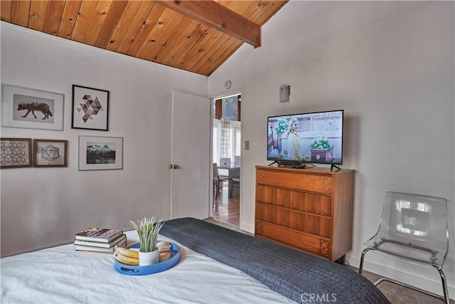 bedroom featuring wooden ceiling and vaulted ceiling with beams