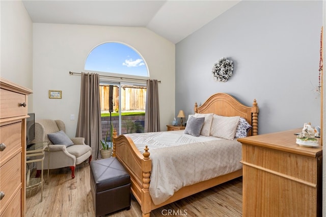 27263 Family Cir, Menifee, CA 92586 - bedroom with light wood-style flooring, access to outside, and lofted ceiling