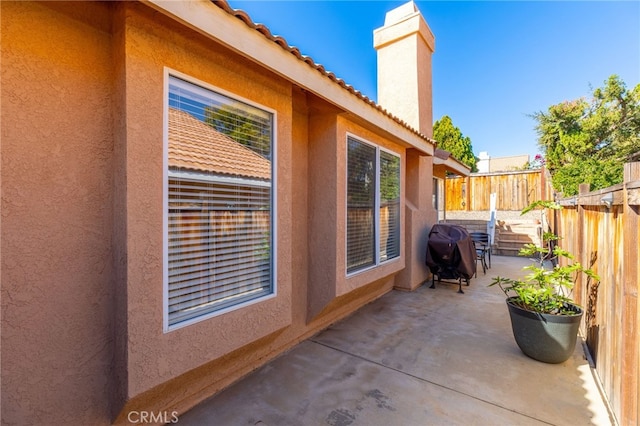27263 Family Cir, Menifee, CA 92586 - view of patio / terrace with grilling area and fence