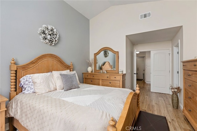 27263 Family Cir, Menifee, CA 92586 - bedroom with light wood-style flooring, visible vents, and lofted ceiling
