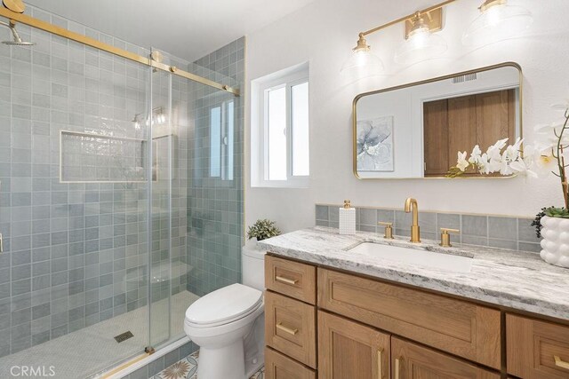 28116 Calle Casal, Mission Viejo, CA 92692 - bathroom featuring a shower stall, vanity, and toilet