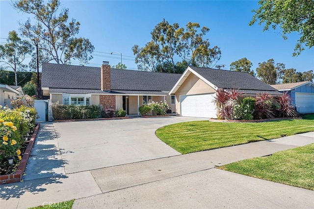 ranch-style home featuring a chimney, a garage, a front lawn, concrete driveway, and stucco siding