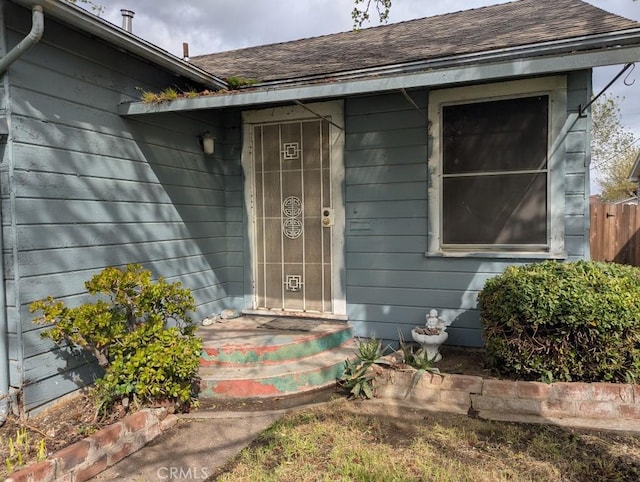 548 S Plumas St, Willows, CA 95988 - property entrance with fence and a shingled roof