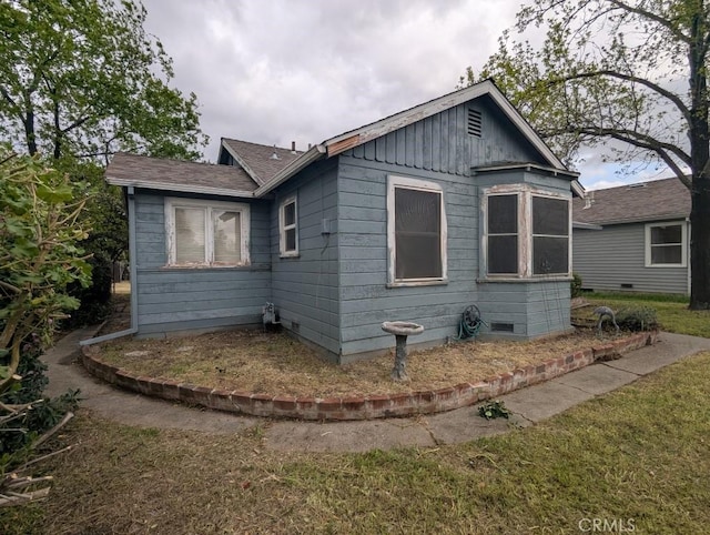 548 S Plumas St, Willows, CA 95988 - view of property exterior with board and batten siding and roof with shingles